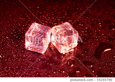 ice cubes on a reflections red light. ice cubes on a reflections red light. 54293790