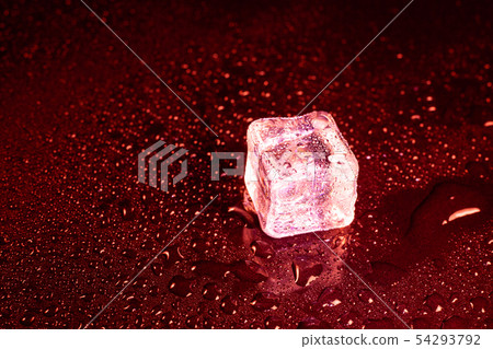 ice cubes on a reflections red light. ice cubes on a reflections red light. 54293792