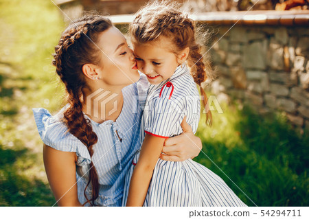 beautiful mother with pretty daughter 54294711