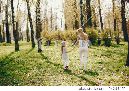 elegant mother with cute daughter 54295451