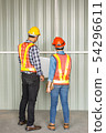 behind of two engineer checking metal sheet 54296611