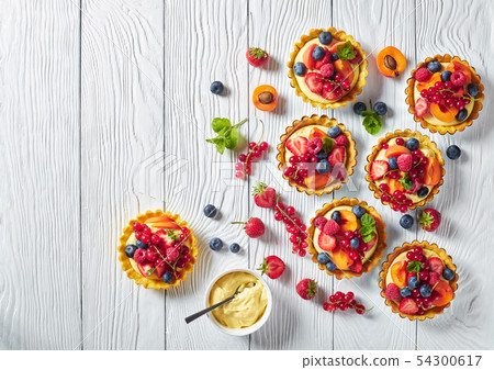 sweet french dessert - tarts with berry and fruit 54300617