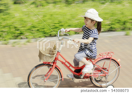 Toddler riding a bicycle (4 years old) Toddler riding a bicycle (4 years old) 54308073