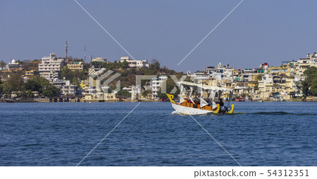 Boat travel in lake Pichola. Boat travel in lake Pichola. 54312351
