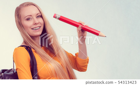 Young woman going to school Young woman going to school 54313423