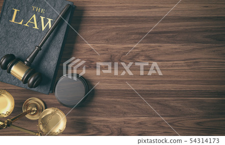 Wooden judge's gavel on law book and golden scale Wooden judge's gavel on law book and golden scale 54314173