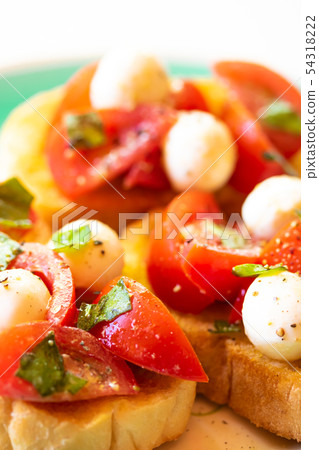 Bruschetta with tomato and mozzarella cheese 54318222