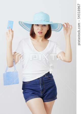 Woman in hat hand holding card Woman in hat hand holding card 54318967