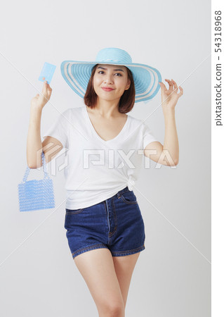 Woman in hat hand holding card Woman in hat hand holding card 54318968