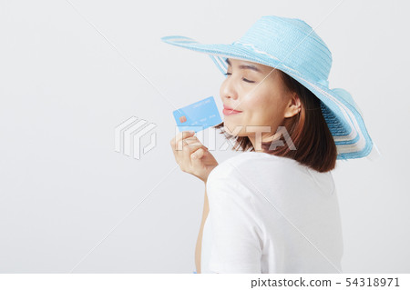 Woman in hat hand holding card Woman in hat hand holding card 54318971