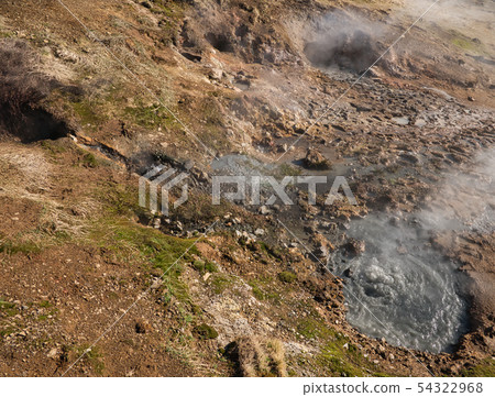 Bubbling mud holes near Reykjadalur in Iceland 54322968