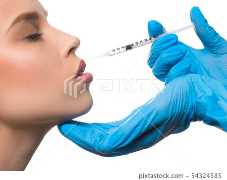 Injections of beauty. Woman face surgery close up portrait. Female model. 54324585