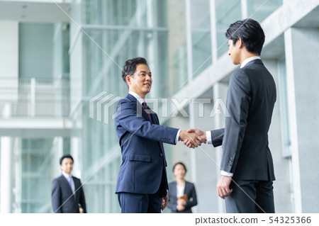 Businessman to shake hands negotiate business image Businessman to shake hands negotiate business image 54325366