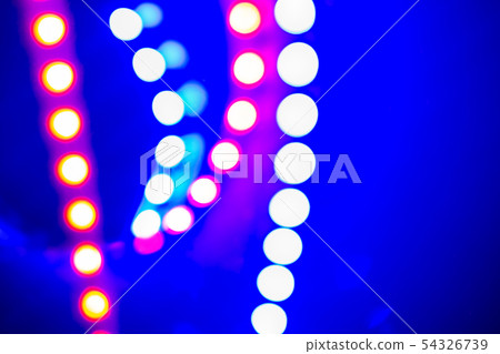Purple blue neon bokeh lights and reflections. Purple blue neon bokeh lights and reflections. 54326739
