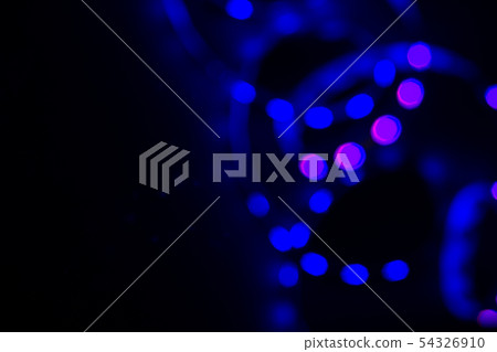 Blue neon blurry spiral led lights on black. 54326910