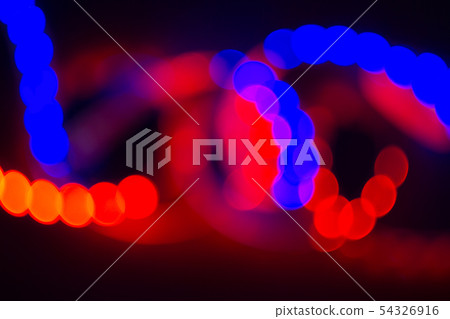 Blurred duotone neon curls of bokeh lights on 54326916