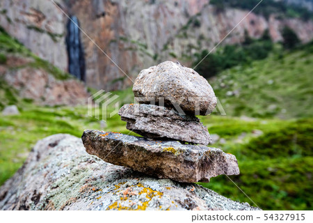 Stone tower of small rocks made in beautiful mountains Stone tower of small rocks made in beautiful mountains 54327915