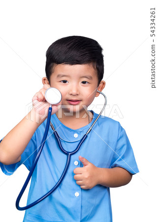 Smiling Asian kid in blue medical uniform holding Smiling Asian kid in blue medical uniform holding 54334261