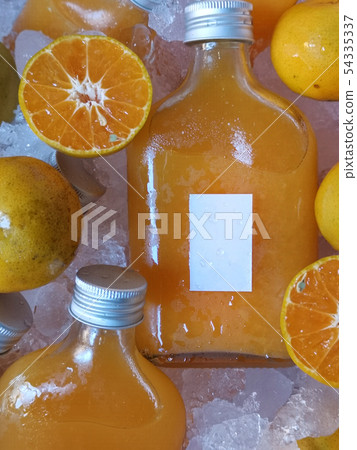 Orange juice bottles  54335337