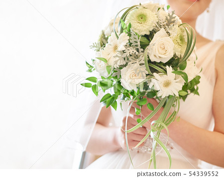 A bride with a bouquet A bride with a bouquet 54339552