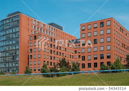 red brick building blocks and blue sky - real red brick building blocks and blue sky - real 54343514