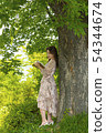 Young woman reading Korean 54344674