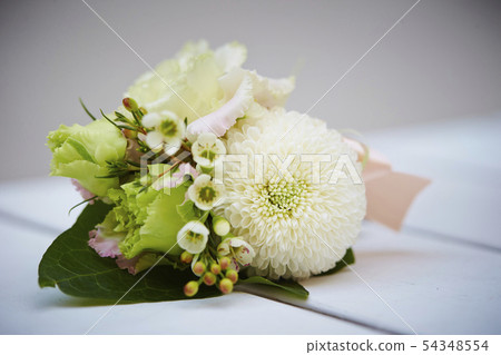 Corsage of flower arrangement using pompon chrysanthemum Corsage of flower arrangement using pompon chrysanthemum 54348554