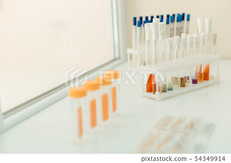 Close up of a test tube rack on the table Close up of a test tube rack on the table 54349914