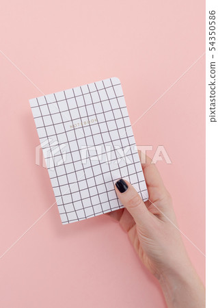 Woman hand with notebook Woman hand with notebook 54350586