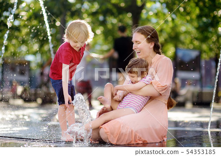 Mother with disabled girl and boy having fun on Mother with disabled girl and boy having fun on 54353185