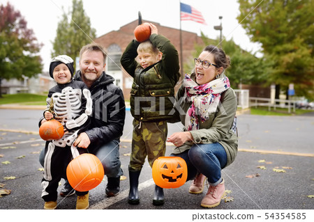 Family with two children on traditional party for 54354585