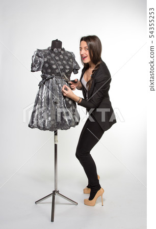 Woman with mannequin Woman with mannequin 54355253