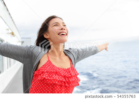 Cruise ship woman on boat in happy free pose 54355763