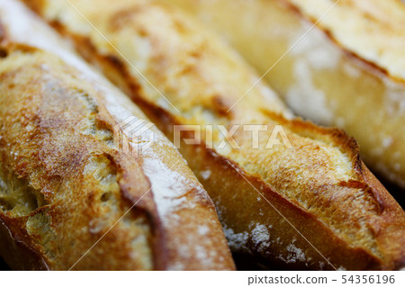 freshly baked rustic french baguettes 54356196
