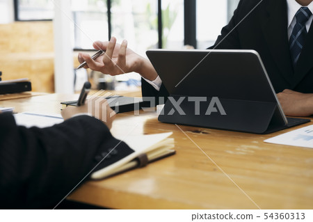 Businessmen teamwork meeting to discuss the Businessmen teamwork meeting to discuss the 54360313