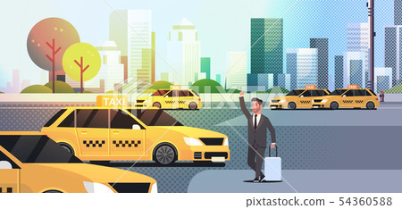 businessman catching taxi on street business man in formal wear with luggage stopping yellow cab 54360588