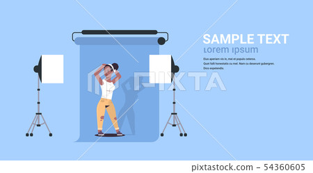 young woman model in casual clothes posing modern professional photo studio interior smiling african 54360605