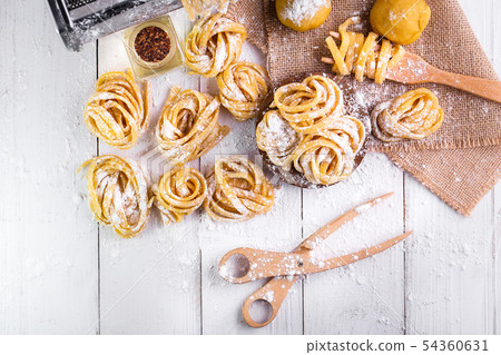 pasta with pasta ingredients on the dark wooden 54360631