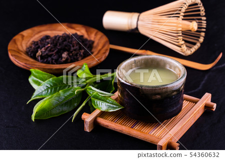 Top view of green tea matcha in a bowl on wooden 54360632