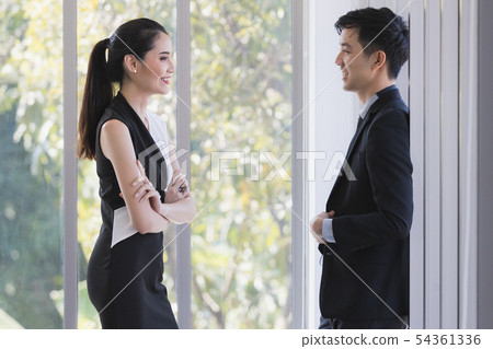 Asian business people talking together in Asian business people talking together in 54361336