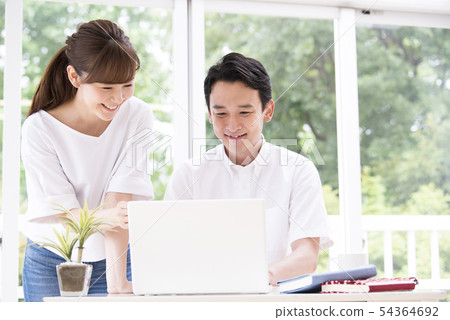 Married couple searching on computer 54364692