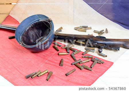 french helmet of the First World War with a gun on 54367860