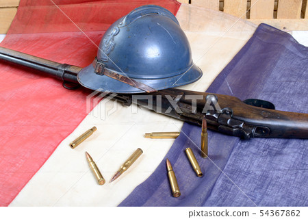 french helmet of the First World War with a gun on 54367862