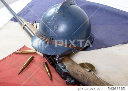 french helmet of the First World War with a gun on 54368365