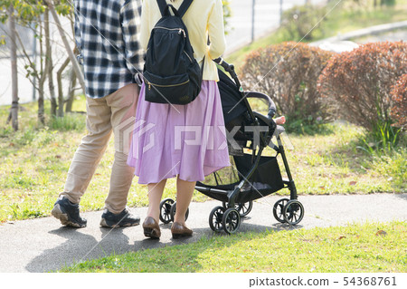 Family going out with baby with baby stroller Park Walk Parenting Family going out with baby with baby stroller Park Walk Parenting 54368761