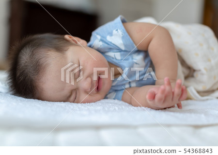 Baby's sleeping face 54368843