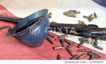 french helmet of the First World War with a gun on 54368895
