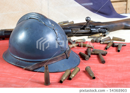 french helmet of the First World War with a gun on french helmet of the First World War with a gun on 54368903