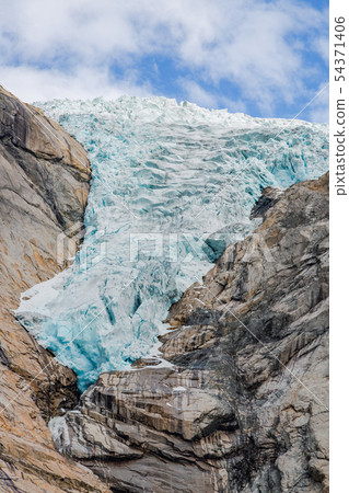 Melting Briksdal glacier in Norway, close up 54371406