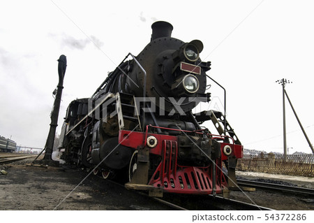 Chinese steam locomotive receiving maintenance 54372286